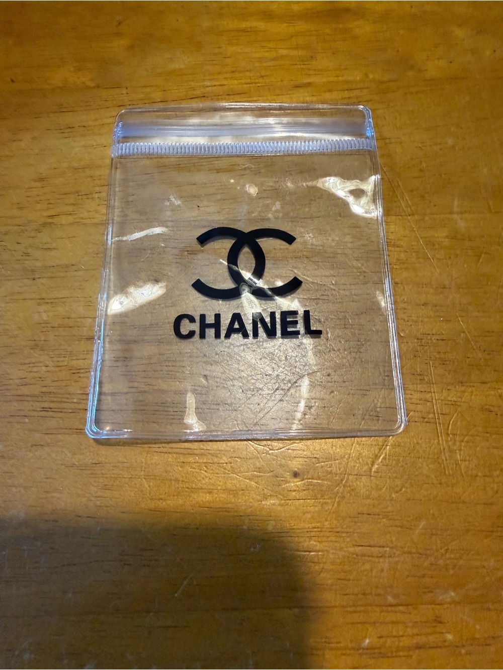 CHANEL clear pouch 3x4” NWOT
